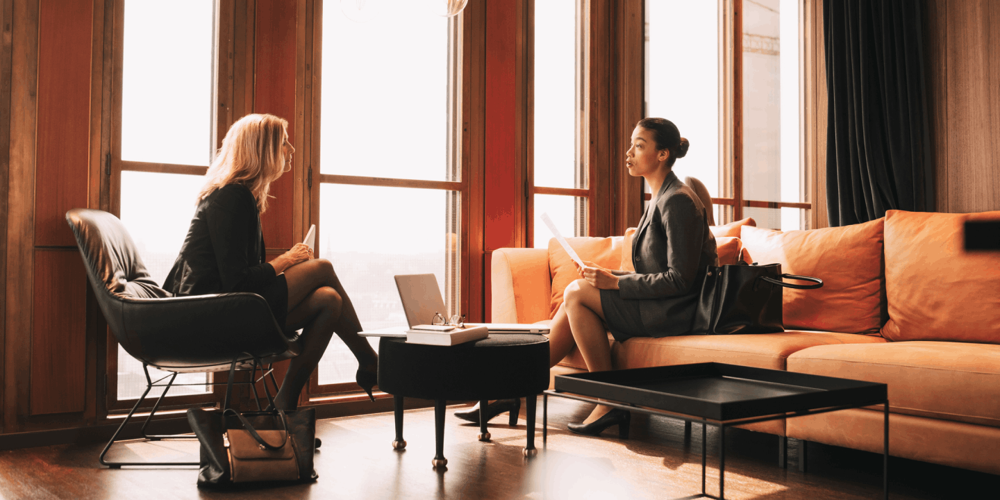 Two women sitting having a conversation